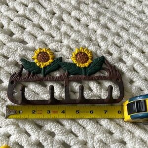 Antique turn of century. Heavy cast iron, sunflower, 4 hooks hanger. EUC